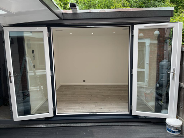 Wide view of the open UPVC French doors
